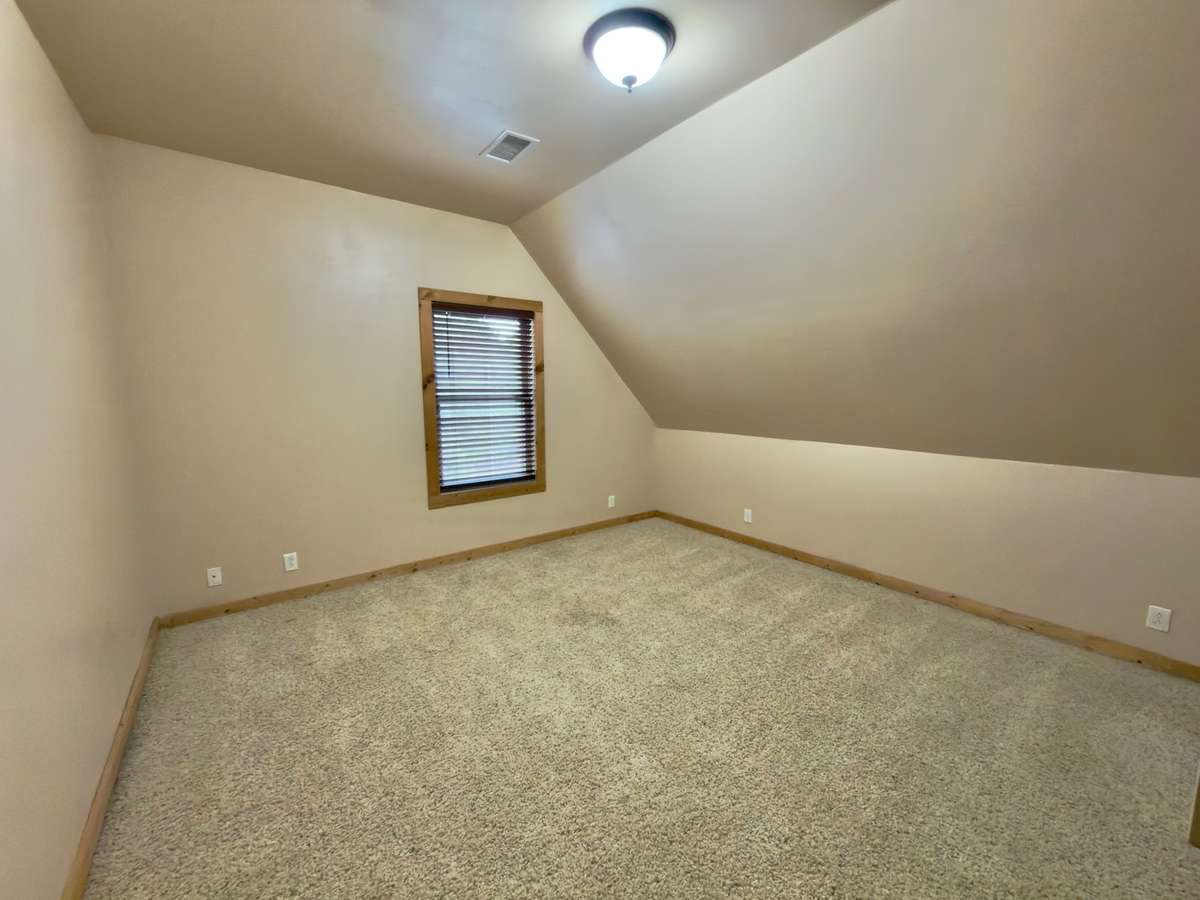 2nd Bedroom on upper level. Measures 17x13 with closet.