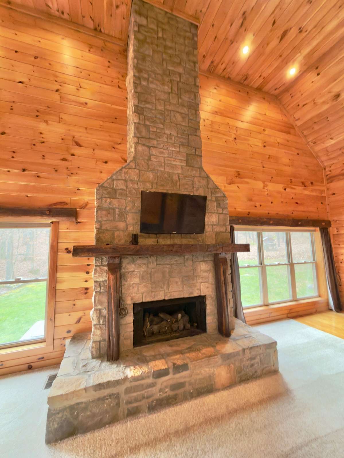22 ft. Stone fireplace in great room.