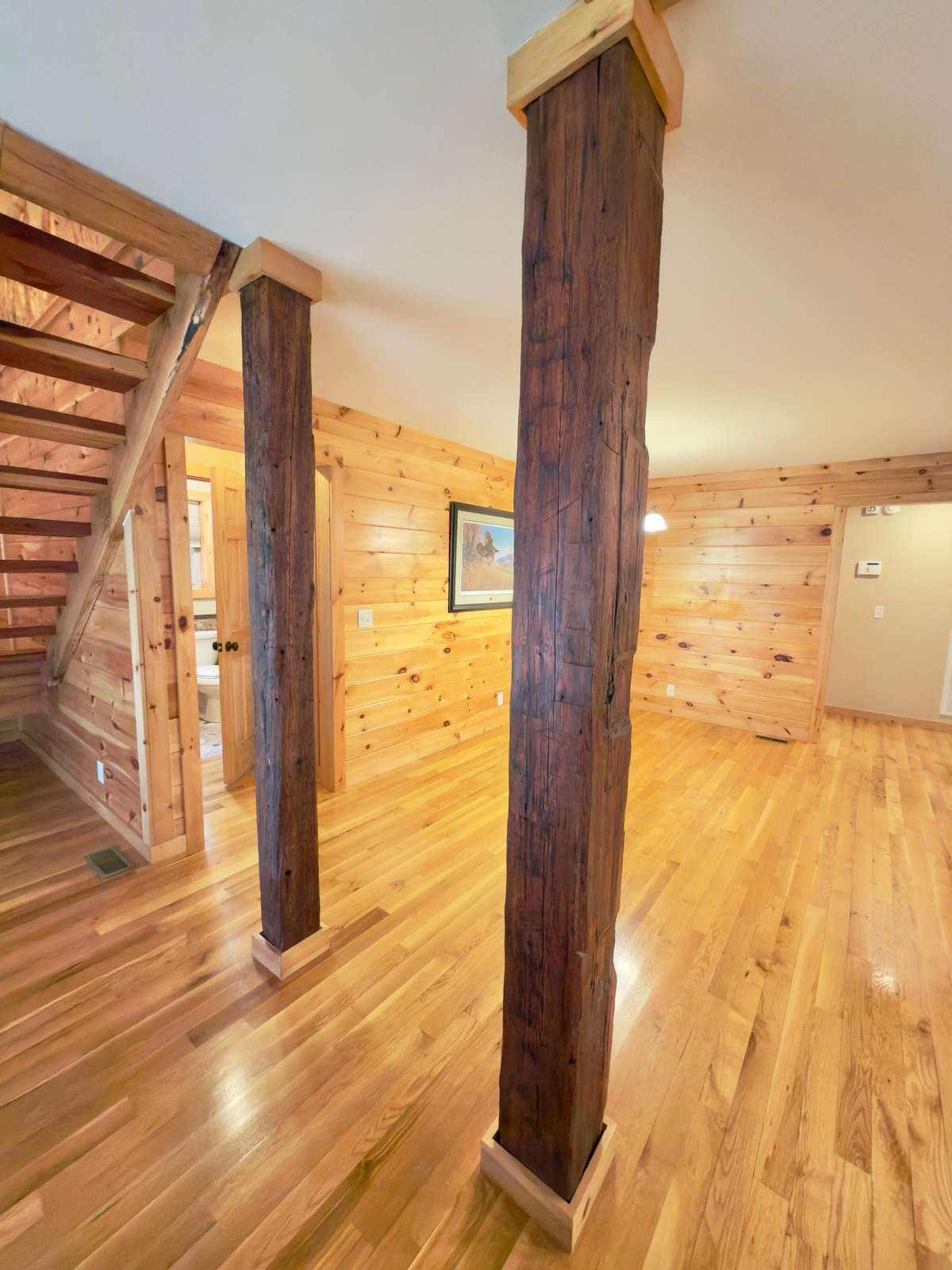 Hand hewn log support beams.