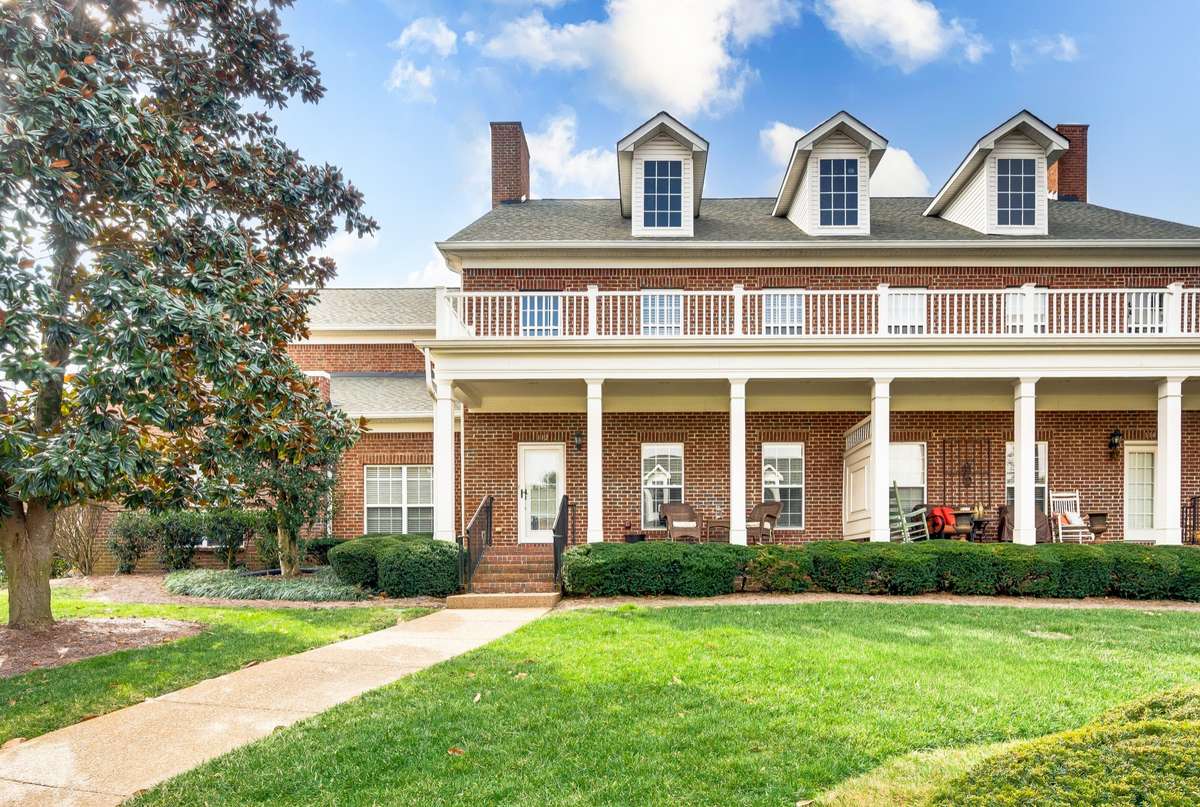 Beautiful brick construction, large windows that bring in natural light, and timeless dormer accents create wonderful curb appeal.