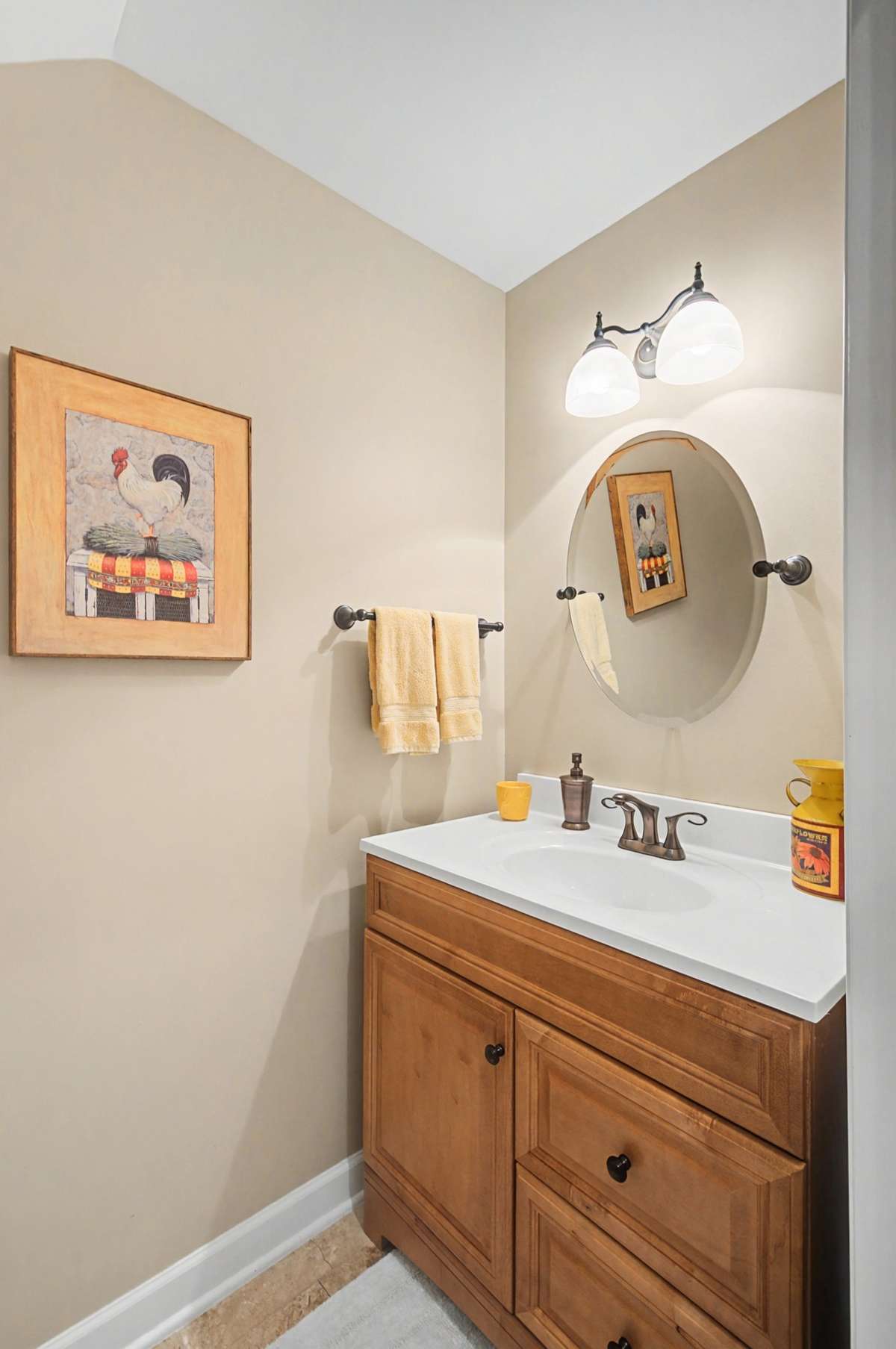 Separate powder bathroom off living area for your guests.  Adjacent Laundry Area on Main Floor allows for one-level living