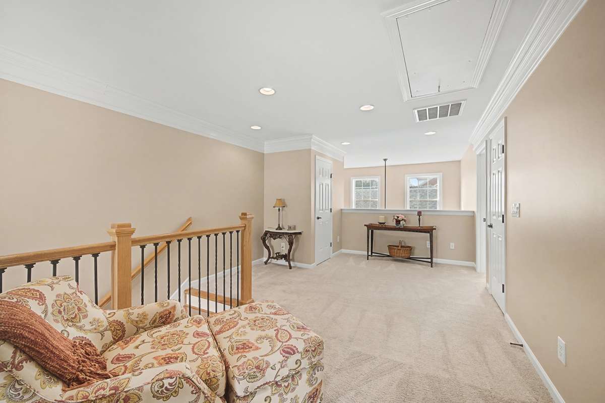Loft area is ideal for a home office or play area