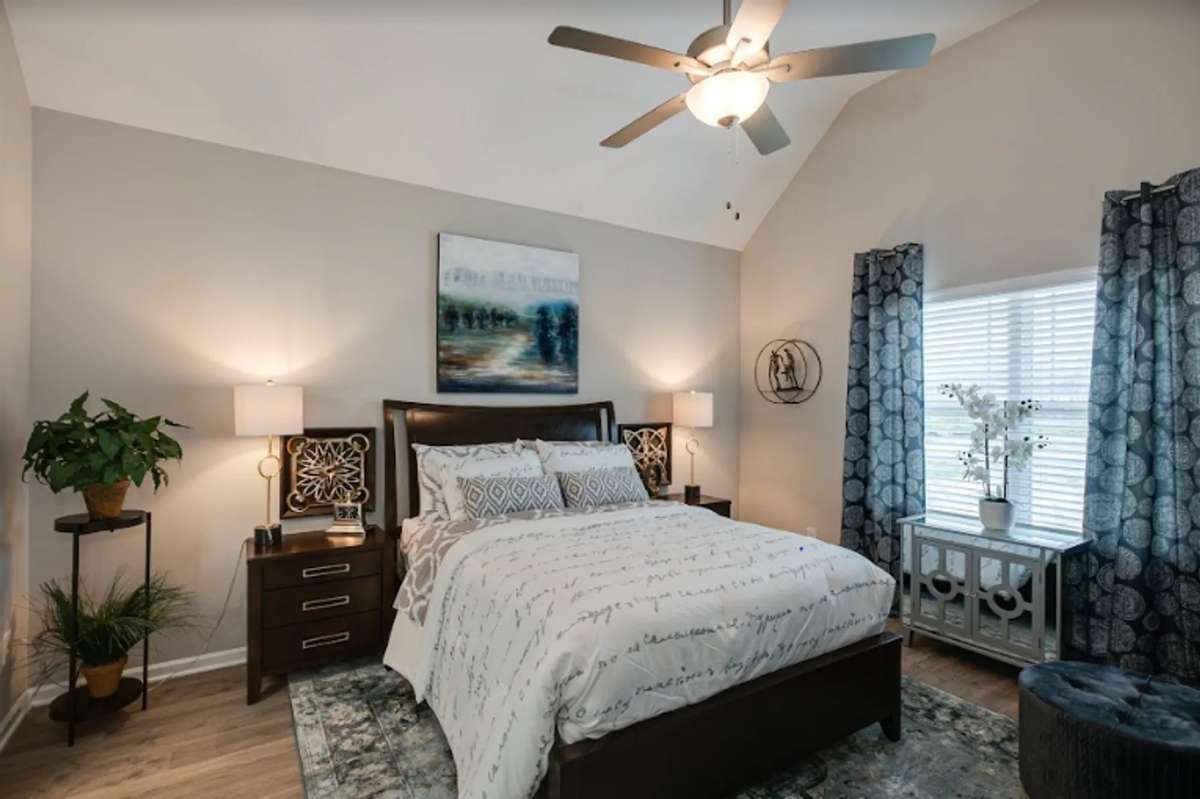 Stock Photo: Primary Suite w/ Vaulted Ceilings