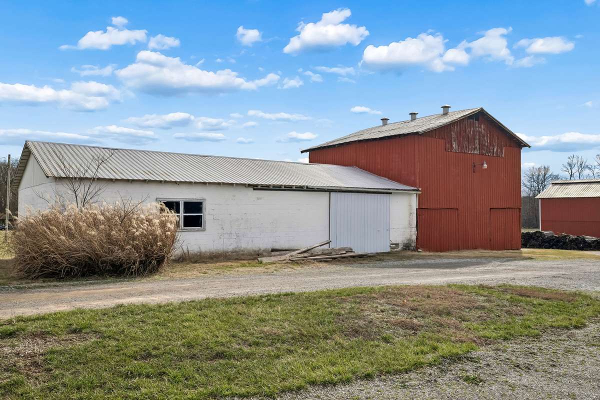 Tobacco stripping house, with attached barn.
