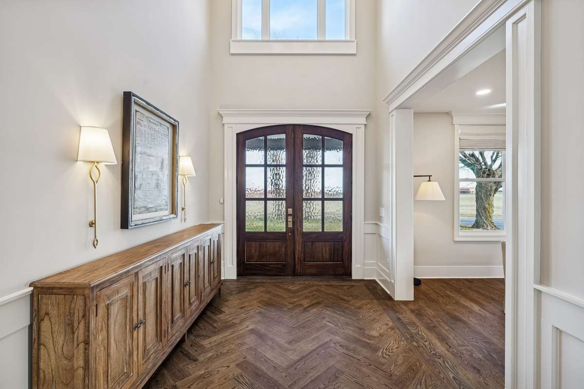 Open foyer with hardwood flooring.