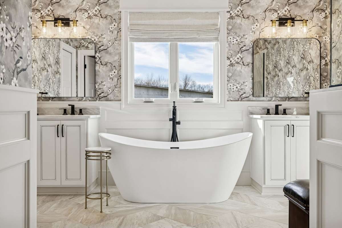 Heated floors, double vanities, separate  tub and tile shower