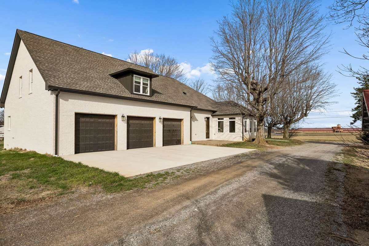 Three car garage, with extra storage