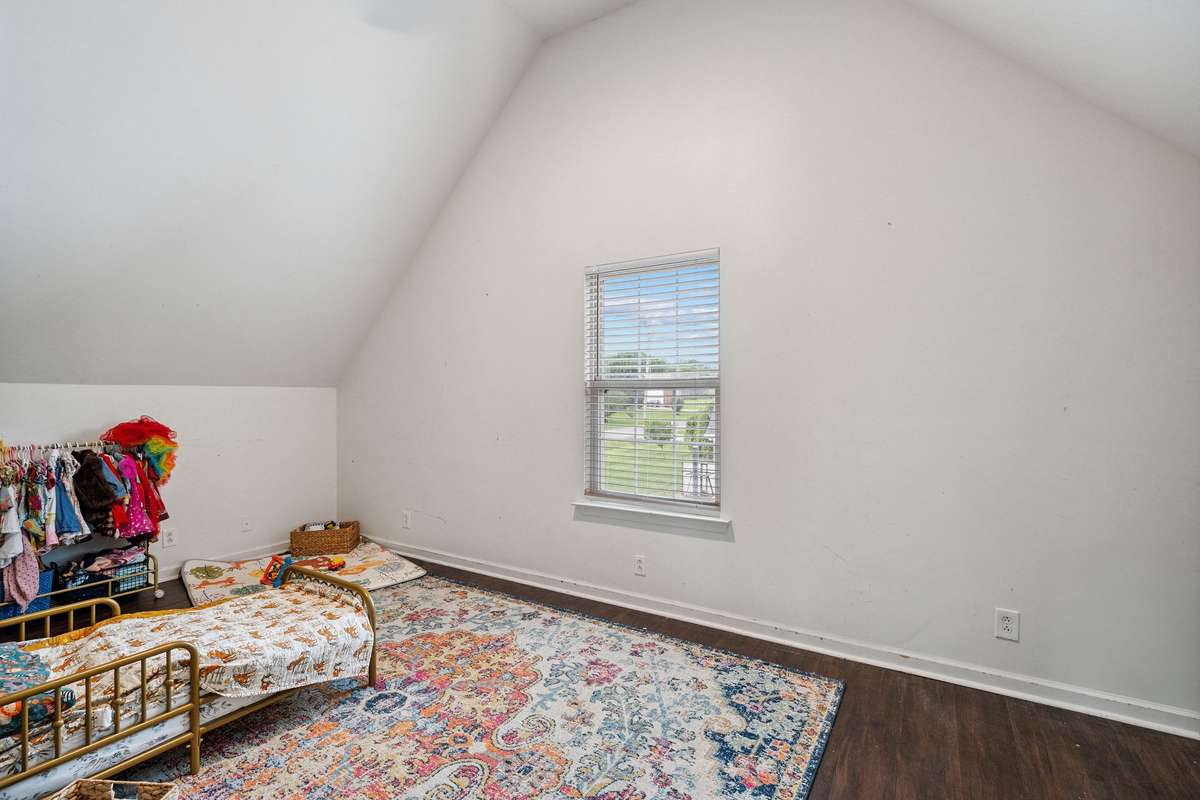 Upstairs bedroom in this 4 bedroom, 3 and a half bathroom in Murfreesboro Tennessee with over half an acre of land and no HOA, a two car garage and updated kitchen.