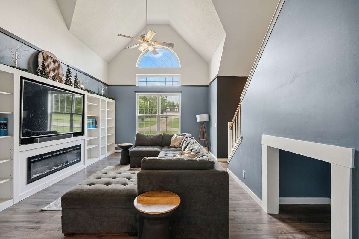 Beautiful living room in this 4 bedroom, 3 and a half bathroom in Murfreesboro Tennessee with over half an acre of land and no HOA, a two car garage and updated kitchen.