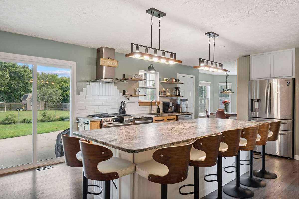 Beautiful kitchen in this 4 bedroom, 3 and a half bathroom in Murfreesboro Tennessee with over half an acre of land and no HOA, a two car garage and updated kitchen.