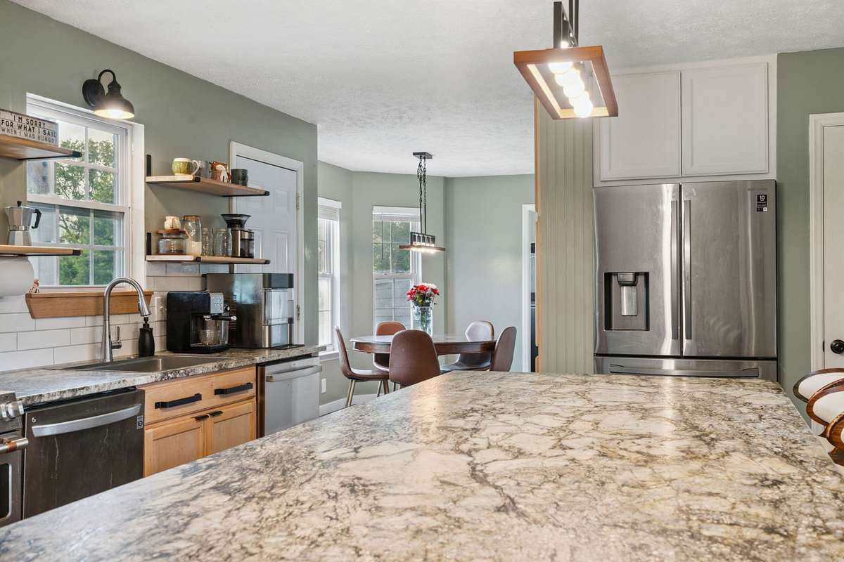 Beautiful kitchen in this 4 bedroom, 3 and a half bathroom in Murfreesboro Tennessee with over half an acre of land and no HOA, a two car garage and updated kitchen.