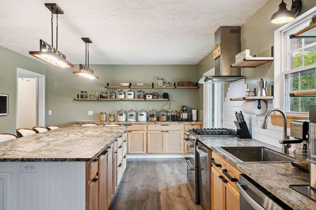 Beautiful kitchen in this 4 bedroom, 3 and a half bathroom in Murfreesboro Tennessee with over half an acre of land and no HOA, a two car garage and updated kitchen.