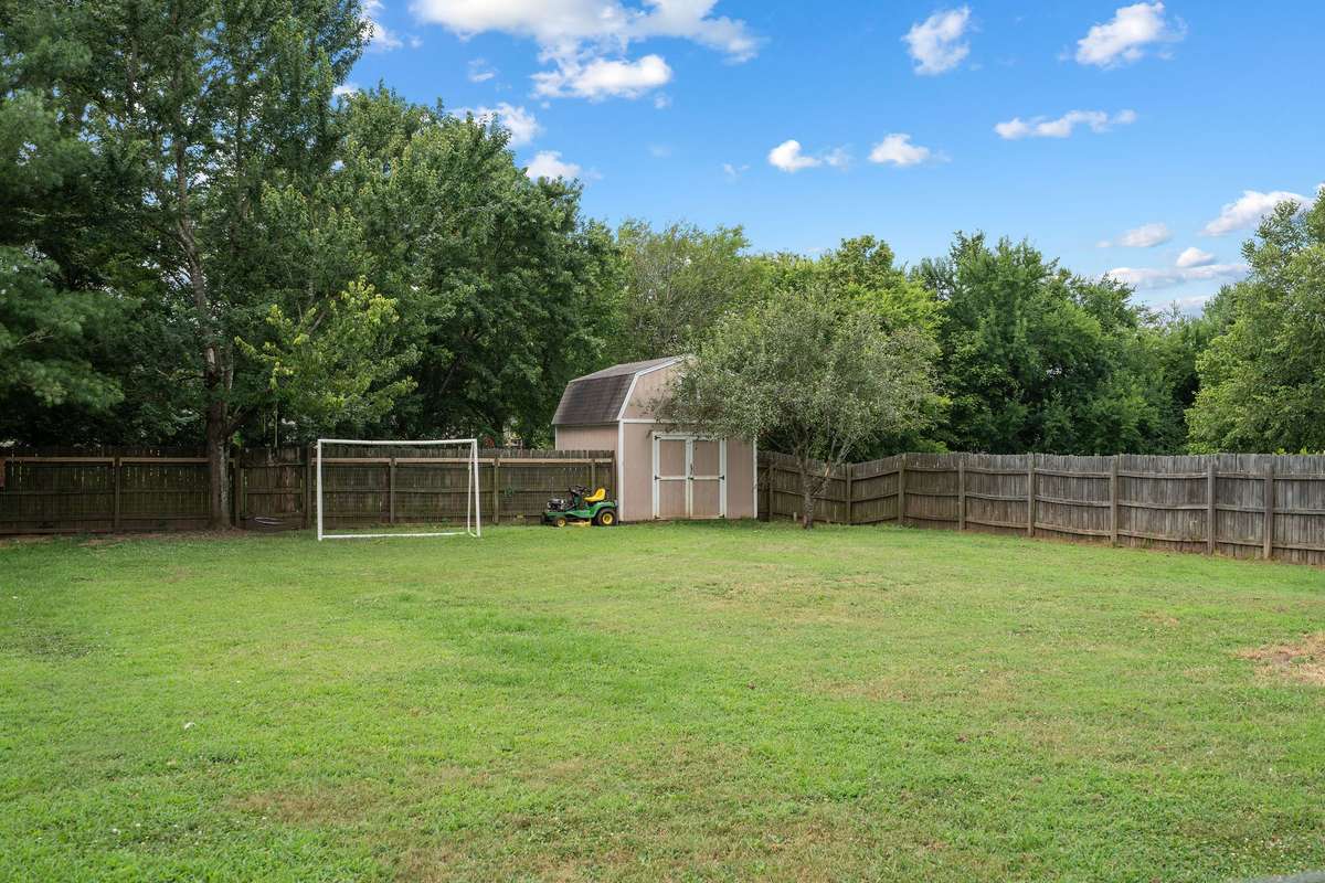 Stunning backyard 4 bedroom, 3 and a half bathroom in Murfreesboro Tennessee with over half an acre of land and no HOA, a two car garage and updated kitchen.