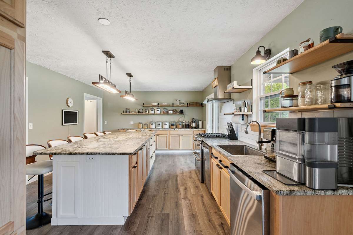 Beautiful kitchen in this 4 bedroom, 3 and a half bathroom in Murfreesboro Tennessee with over half an acre of land and no HOA, a two car garage and updated kitchen.