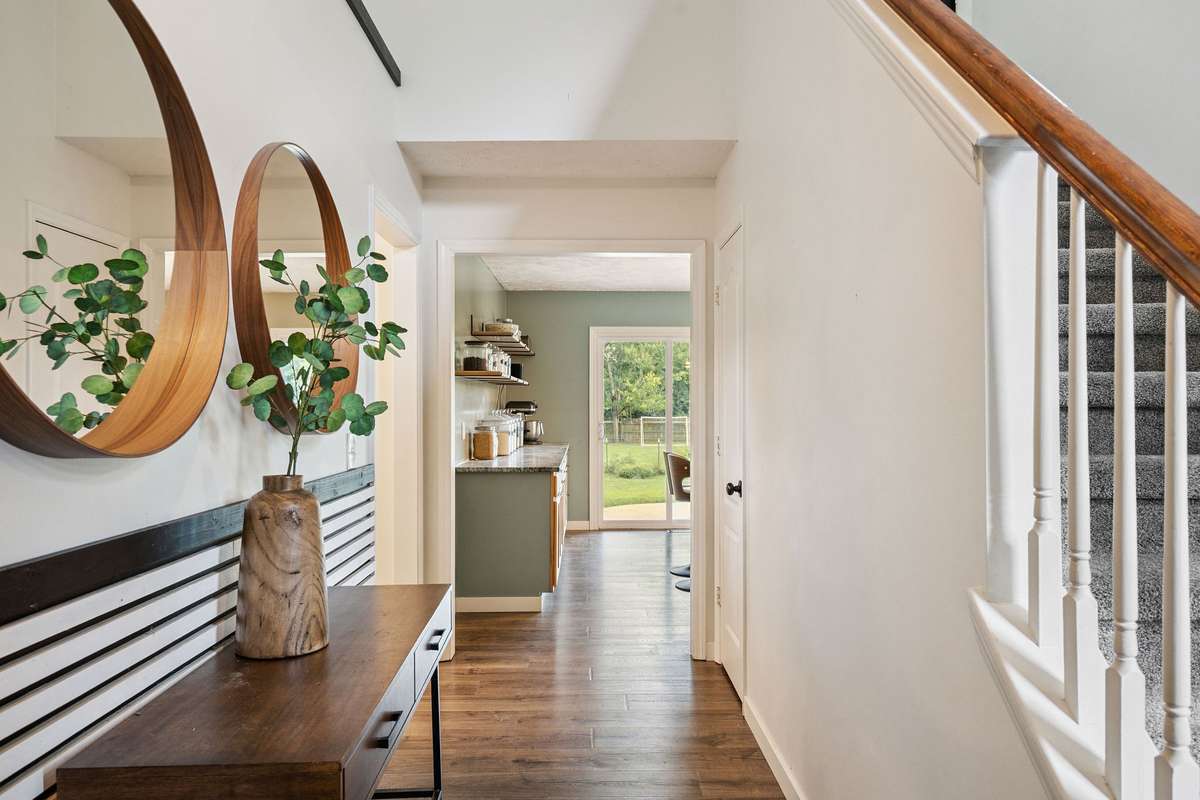 Beautiful entry into this 4 bedroom, 3 and a half bathroom in Murfreesboro Tennessee with over half an acre of land and no HOA, a two car garage and updated kitchen.