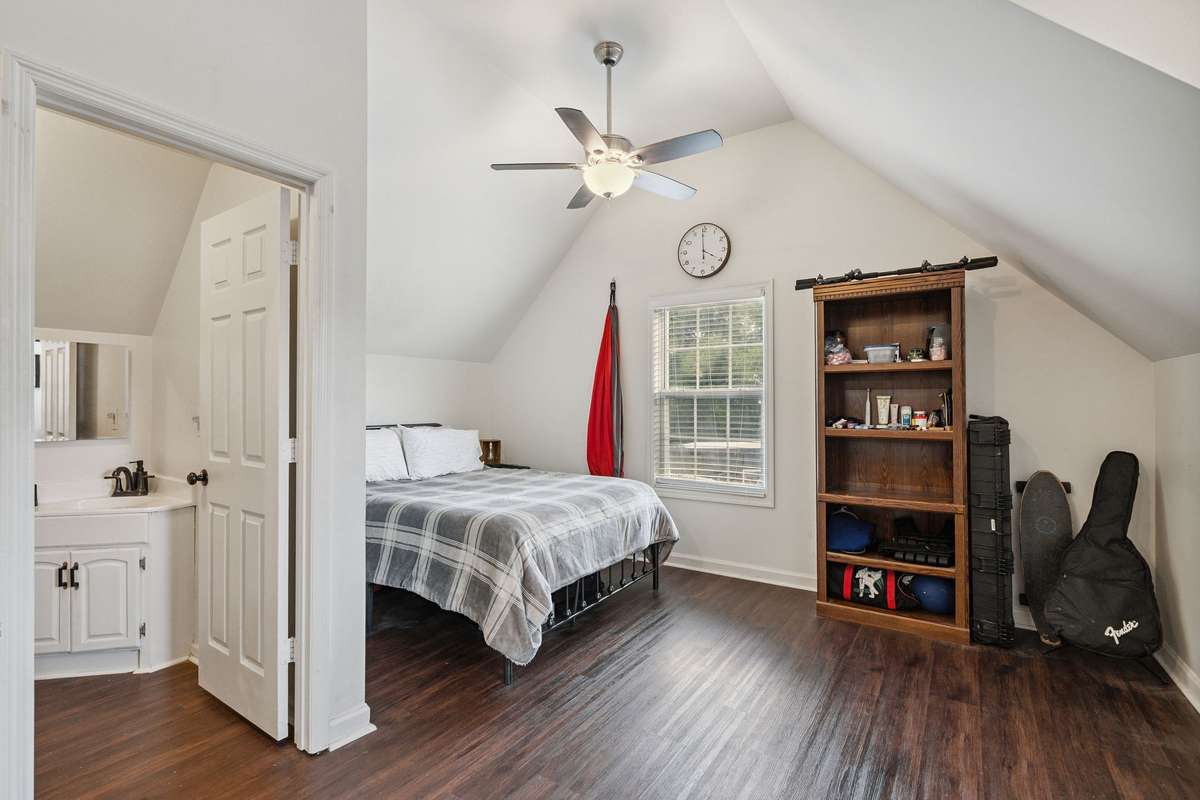 Upstairs bedroom in this 4 bedroom, 3 and a half bathroom in Murfreesboro Tennessee with over half an acre of land and no HOA, a two car garage and updated kitchen.