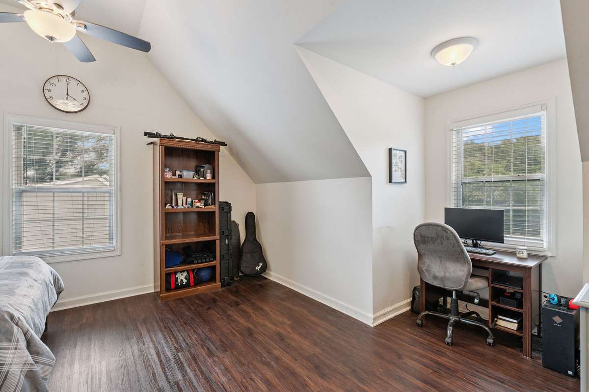 Upstairs bedroom in this 4 bedroom, 3 and a half bathroom in Murfreesboro Tennessee with over half an acre of land and no HOA, a two car garage and updated kitchen.