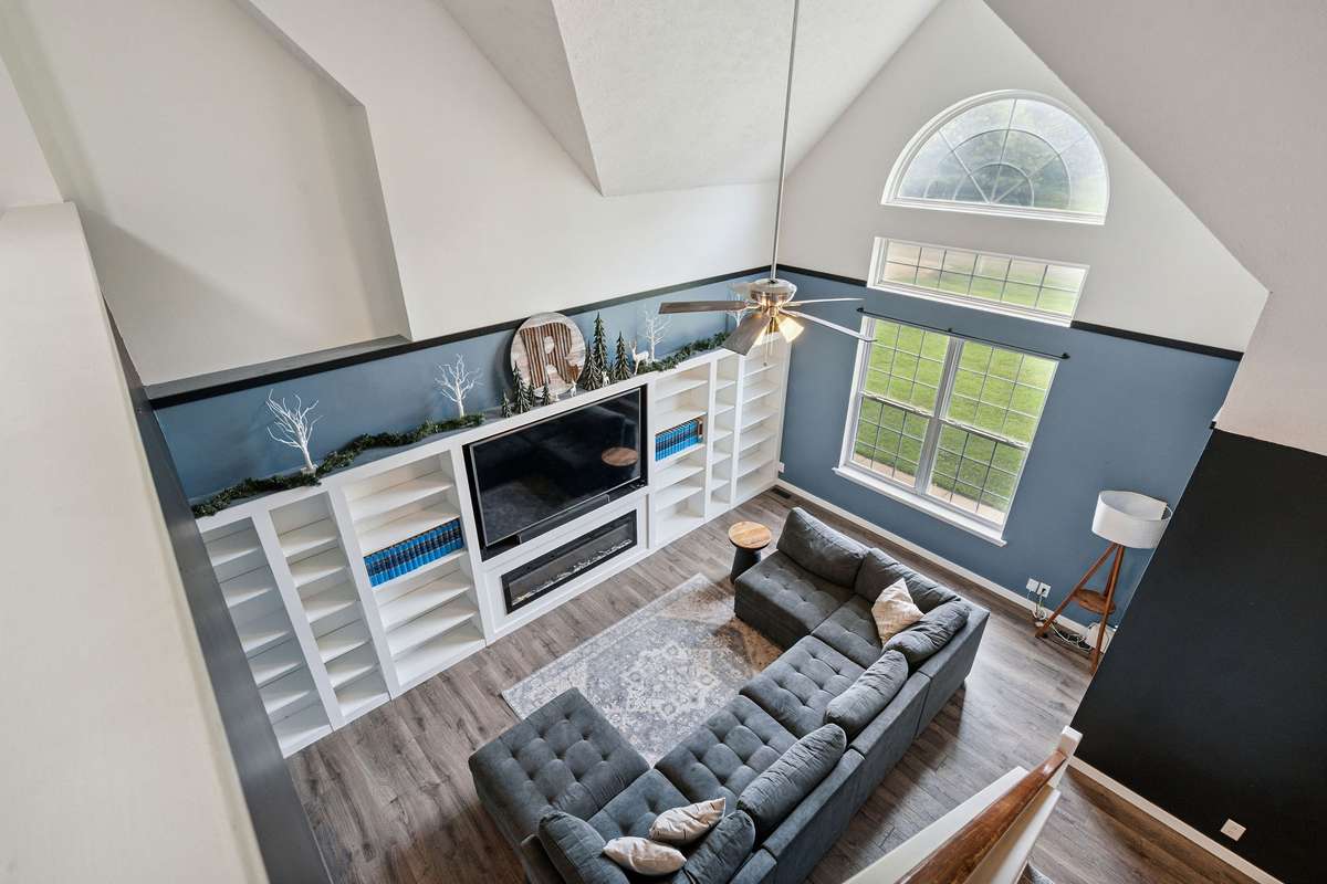 Beautiful living room in this 4 bedroom, 3 and a half bathroom in Murfreesboro Tennessee with over half an acre of land and no HOA, a two car garage and updated kitchen.
