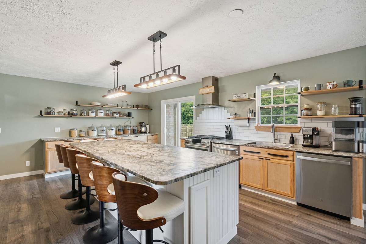 Beautiful kitchen in this 4 bedroom, 3 and a half bathroom in Murfreesboro Tennessee with over half an acre of land and no HOA, a two car garage and updated kitchen.