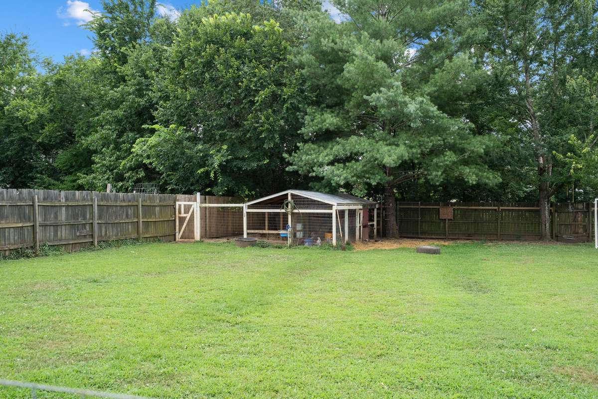 Stunning backyard 4 bedroom, 3 and a half bathroom in Murfreesboro Tennessee with over half an acre of land and no HOA, a two car garage and updated kitchen.