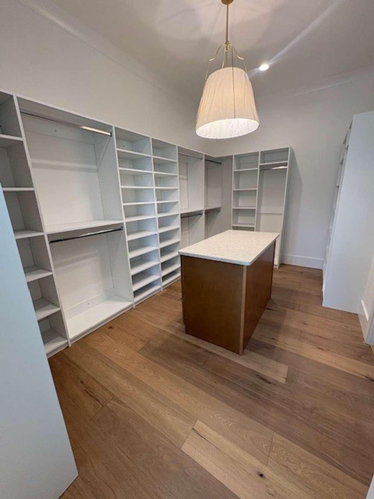 This closet is so big that there are 2 walls on right not even in photo