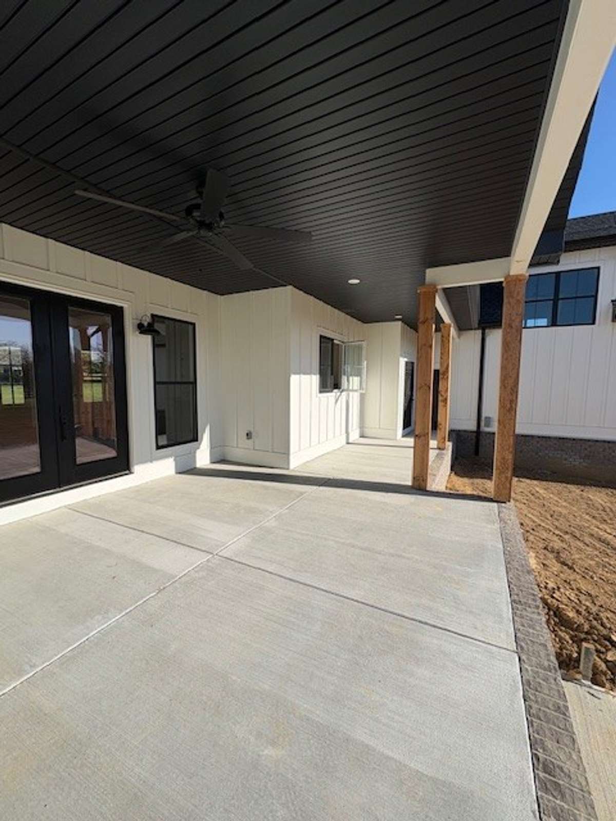 Covered back porch! There is a storage closet and a door into garage so you do not have to go thru house