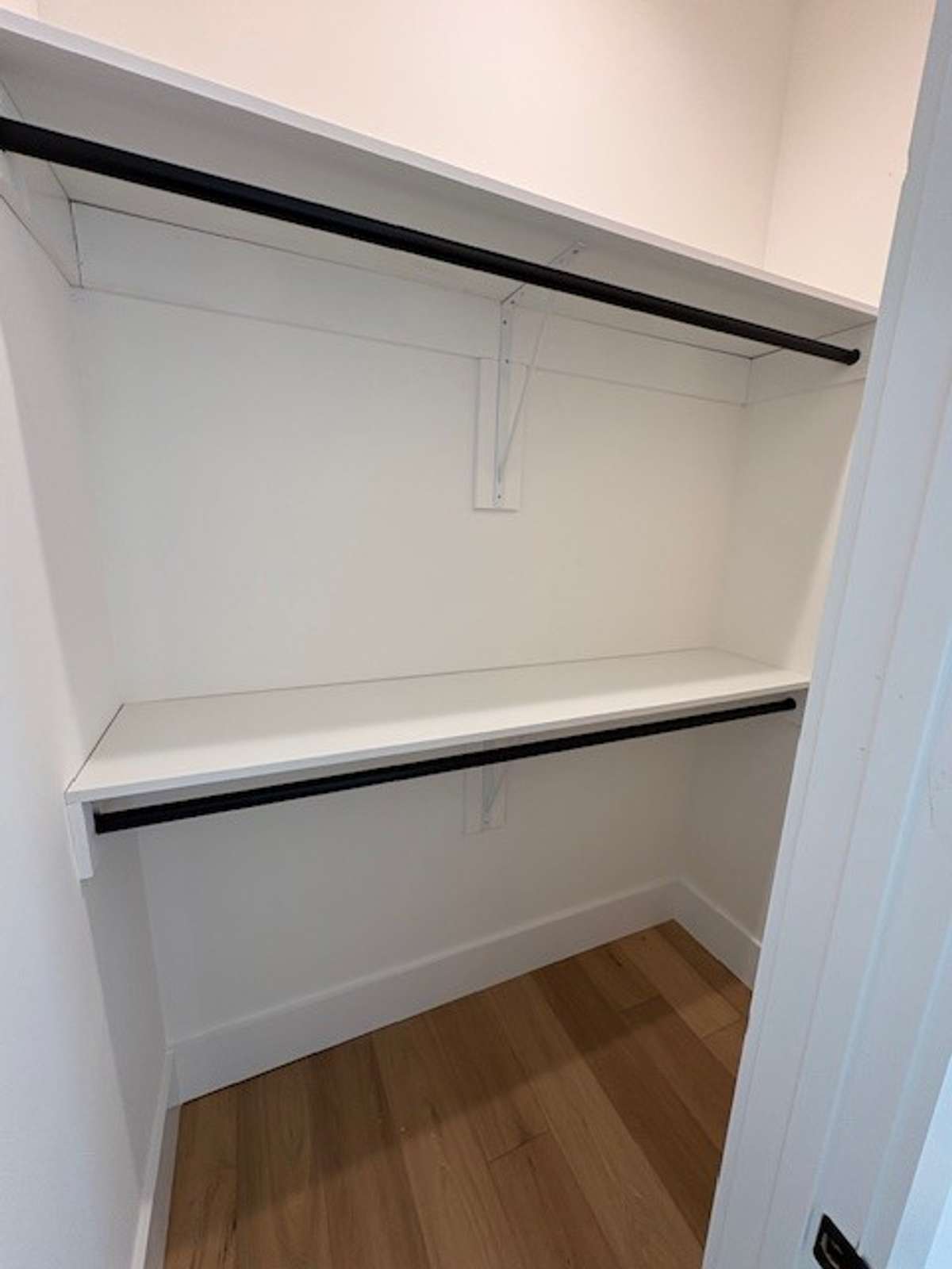 Walk in with double racks in secondary bedroom