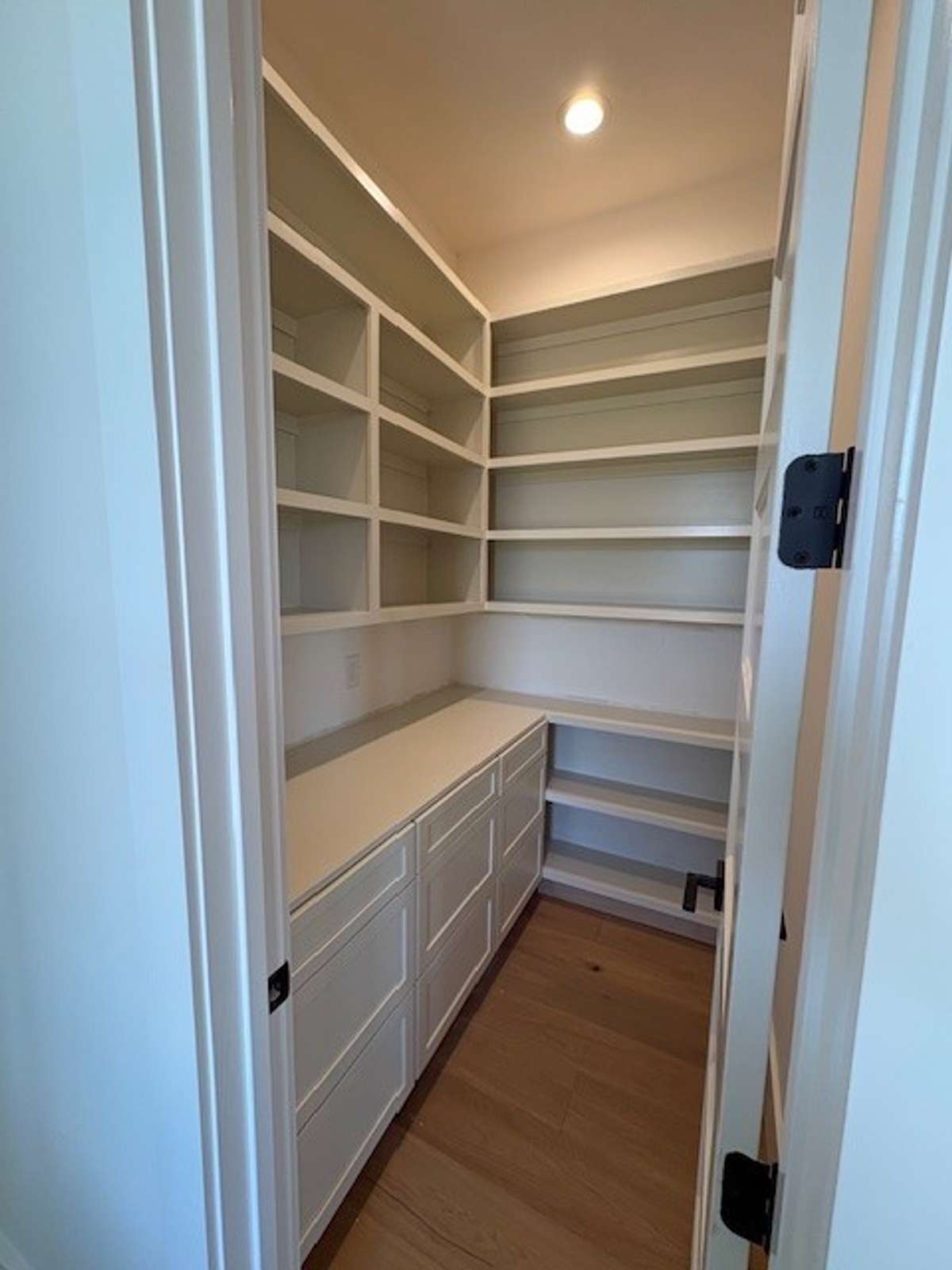 Builit in shelving and drawers in your walk in pantry