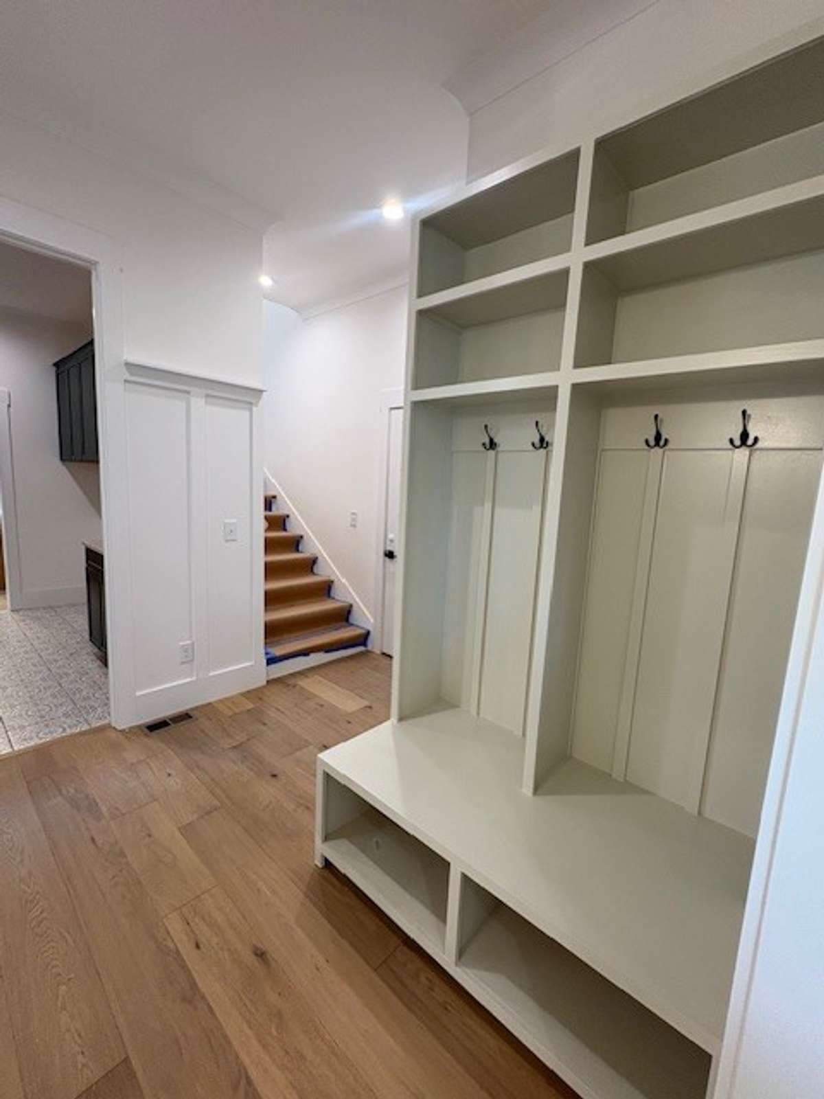 From kitchen peep the stairs on the right going to your upstairs