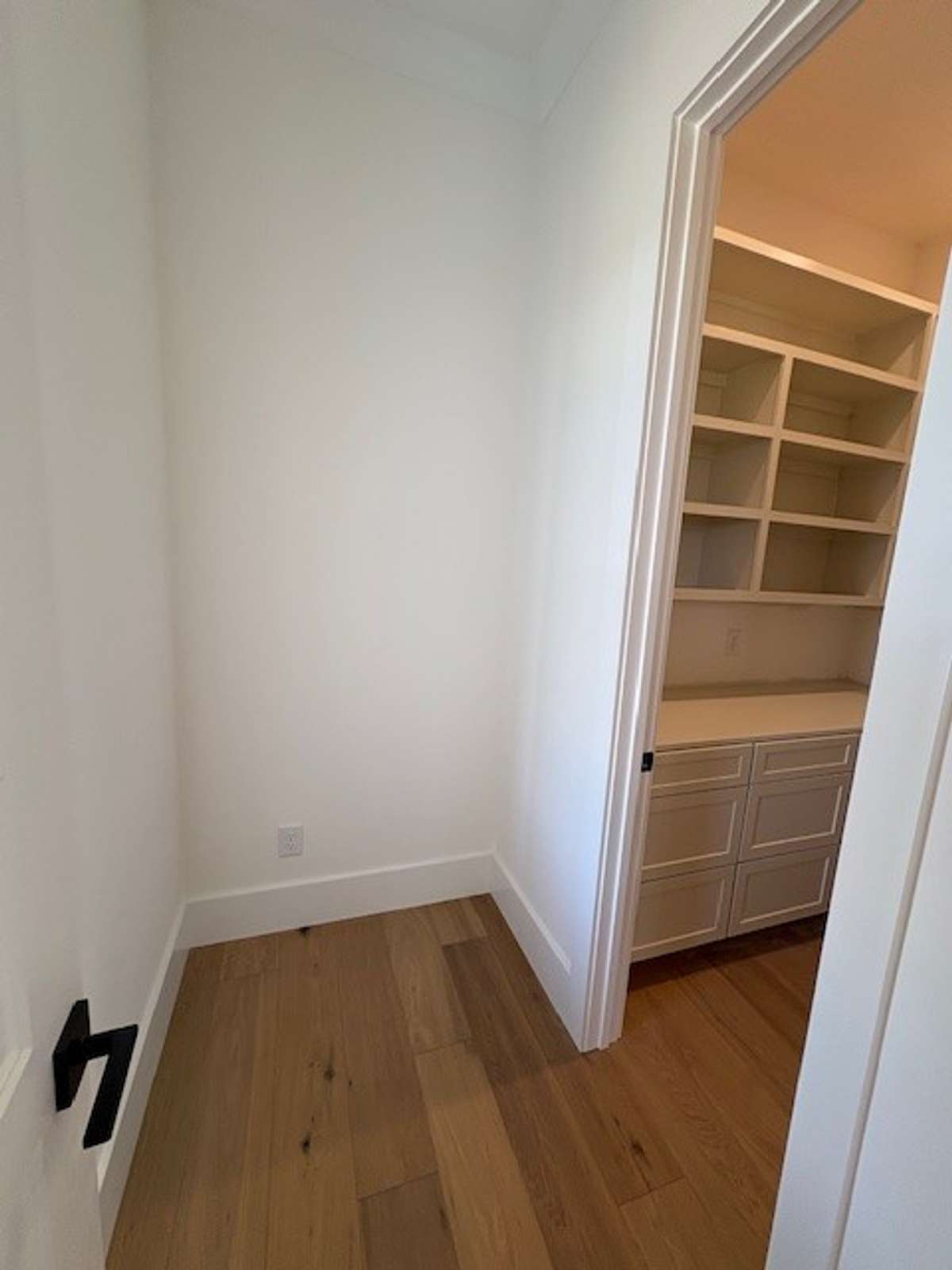 This can be a prep/butlers pantry or great place for a second fridge before going into the walk in pantry
