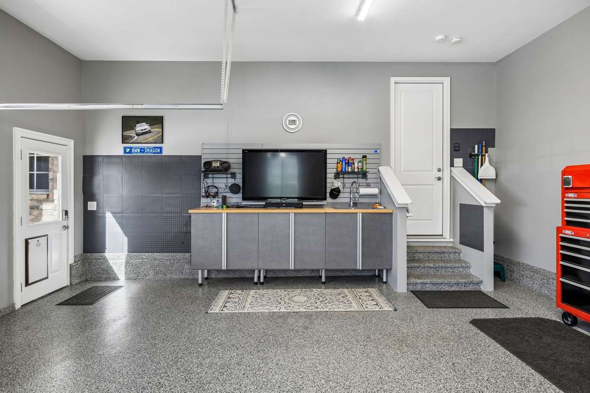 Sink conveniently located to the right of the TV. There are only four steps from the garage into the house.