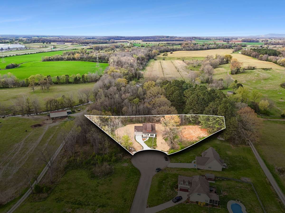 1.18 acre. The end of the cul de sac composed of 2 lots convey as one parcel.