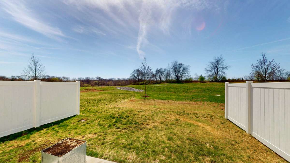 Enjoy no neighbors behind you, only views to the walking trail and common space!