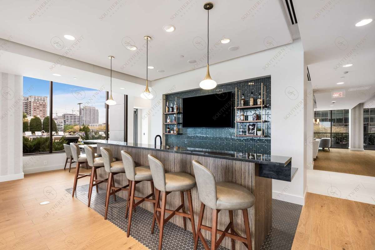 New Owner's lounge complete with its very own bar to meet your neighbors and gather with friends before heading out on the town.