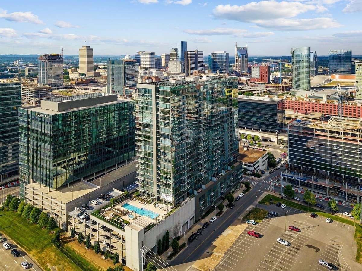Twelve Twelve located in the most central and highest perch in the Gulch District, just off the busy gateway of Demonbreun