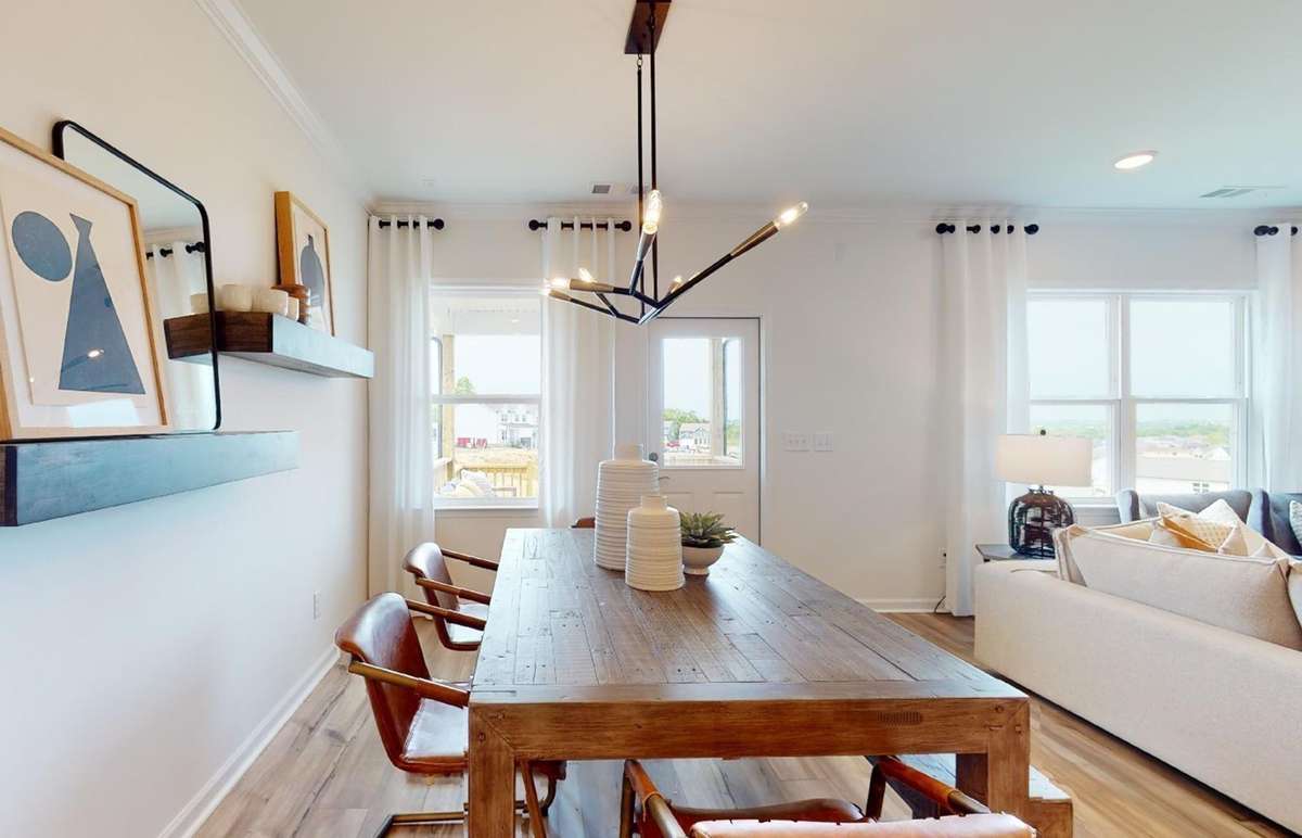 Example/Model photo. 

Dining Room. Lighting and furnishings not included.