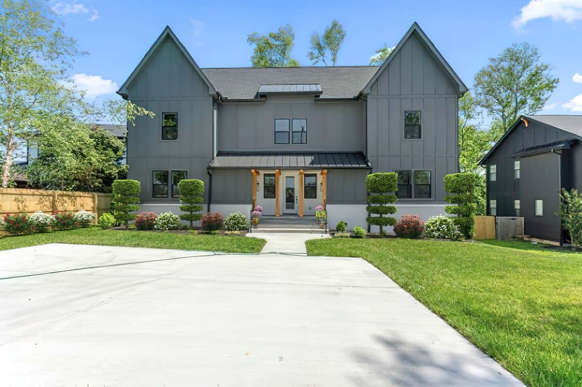 2301 Brittany Dr. is an exceptional home in a convenient location. A true 5-bedroom home with a backyard is a rarity in this zip code! Image has been virtually staged to show mature landscaping.