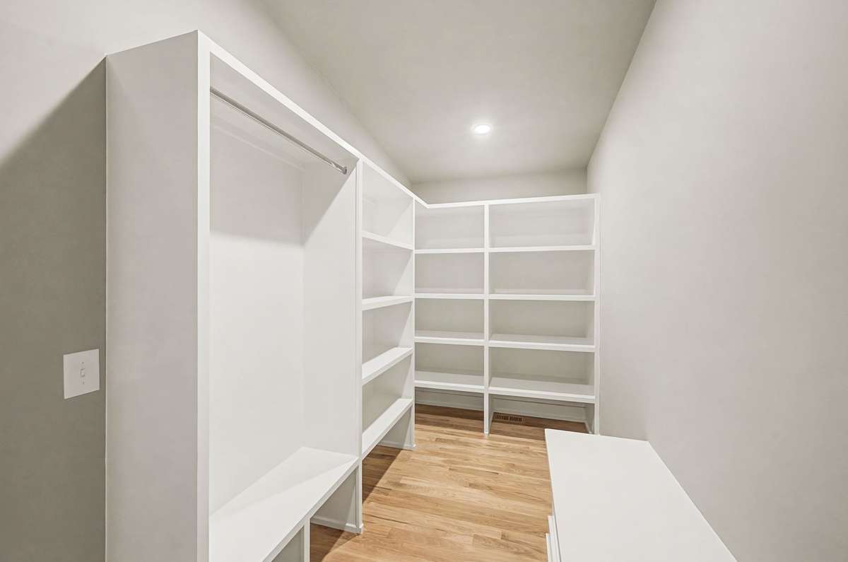 Walk in extra large closet for all your storage needs