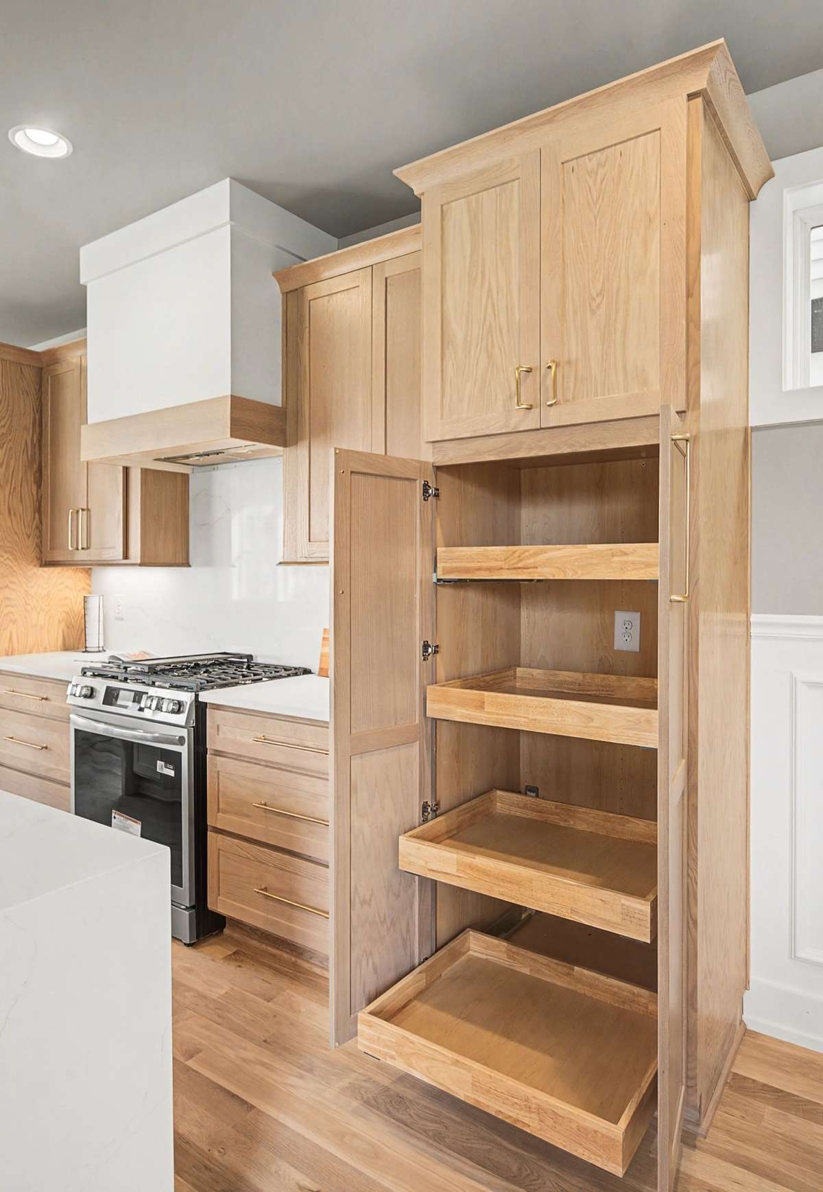 Pull out drawers for ease in storing kitchen appliances and pantry goods