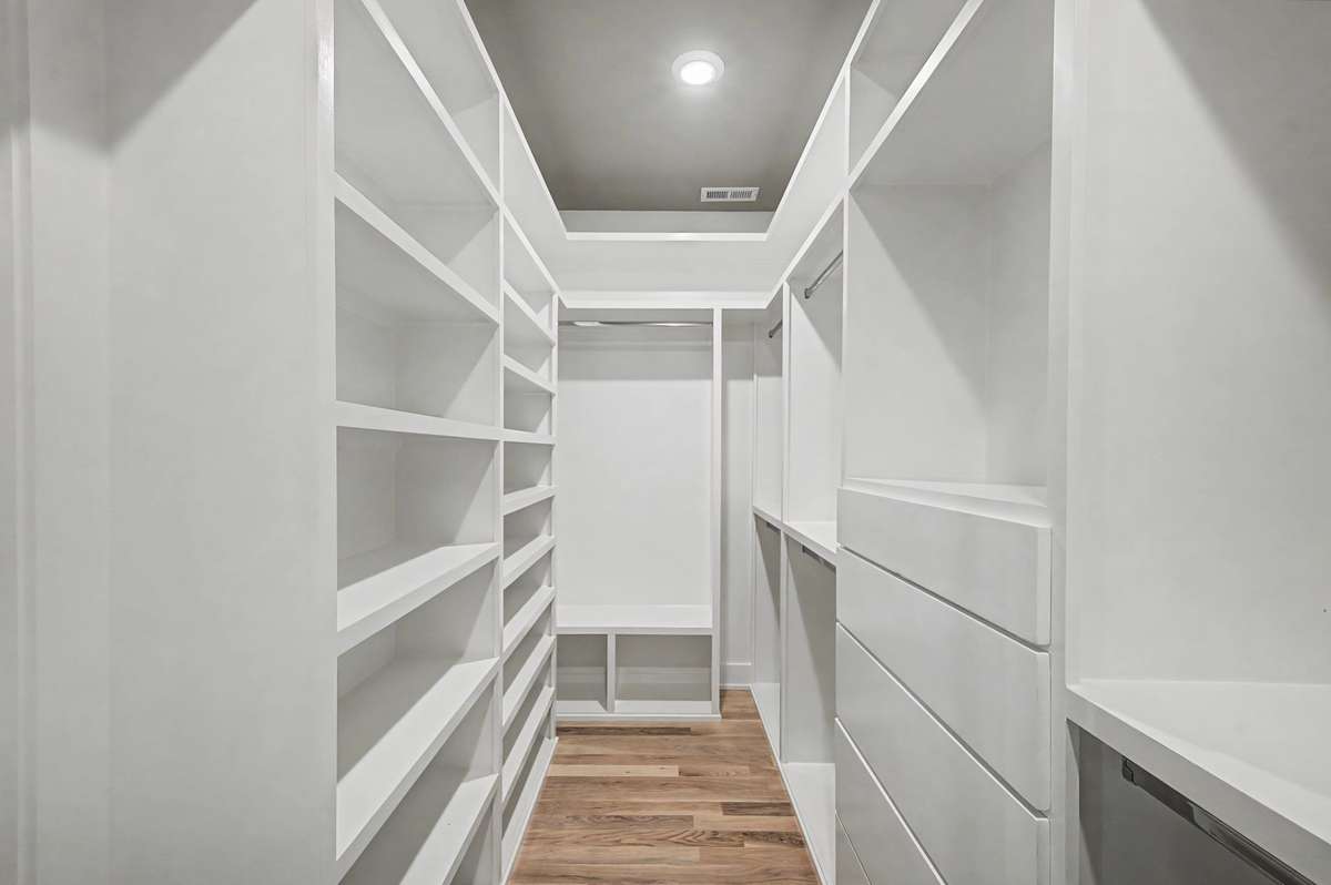 Primary closet with plenty of space for all your needs