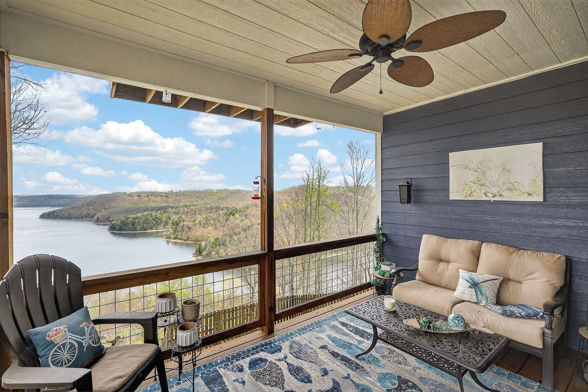 Main floor lake view covered deck