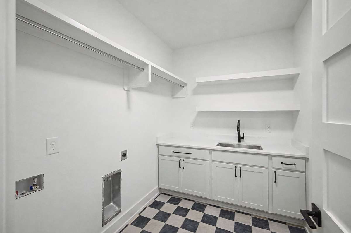 Large Laundry room with sink