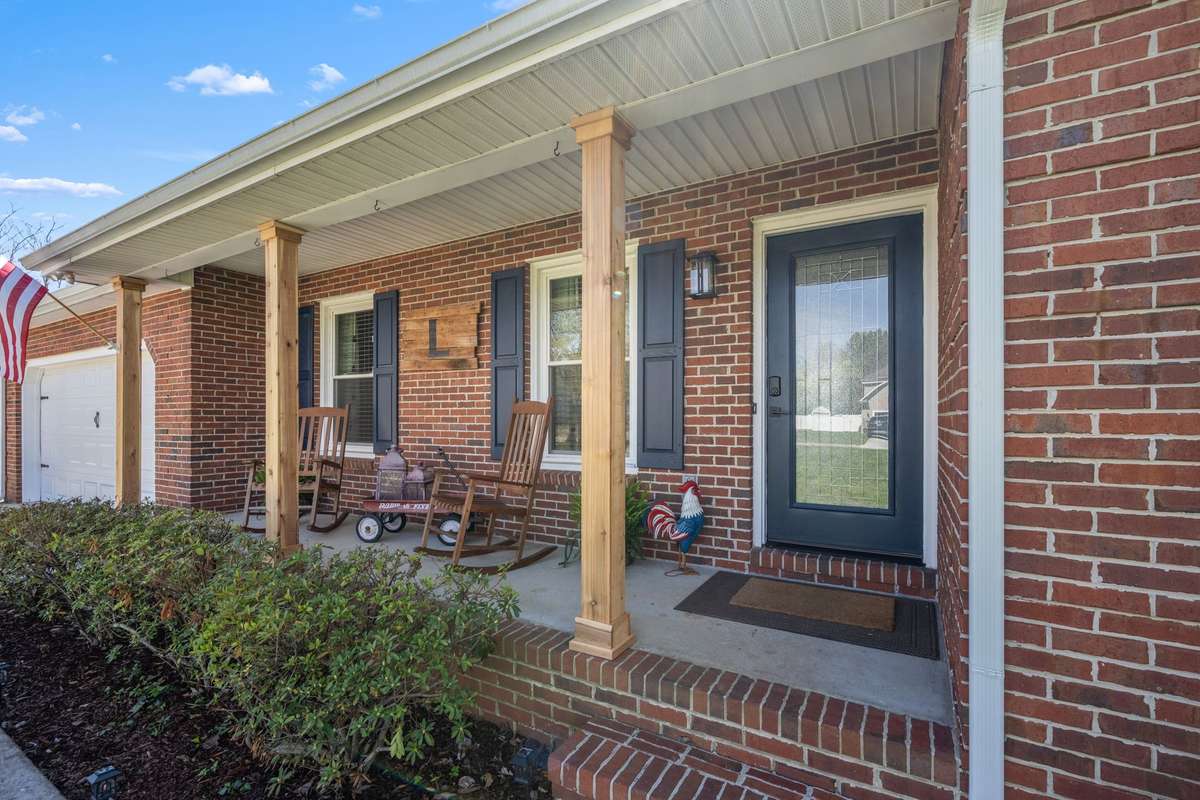 Enjoy sitting outdoors on the covered front porch.