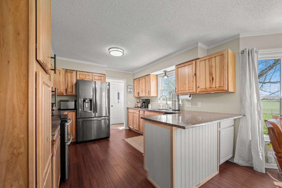 Kitchen is open to the Dining Room