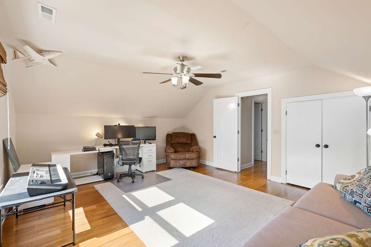 Bedroom #4/Bonus Room lets in a lot of natural light and has a large double door closet.