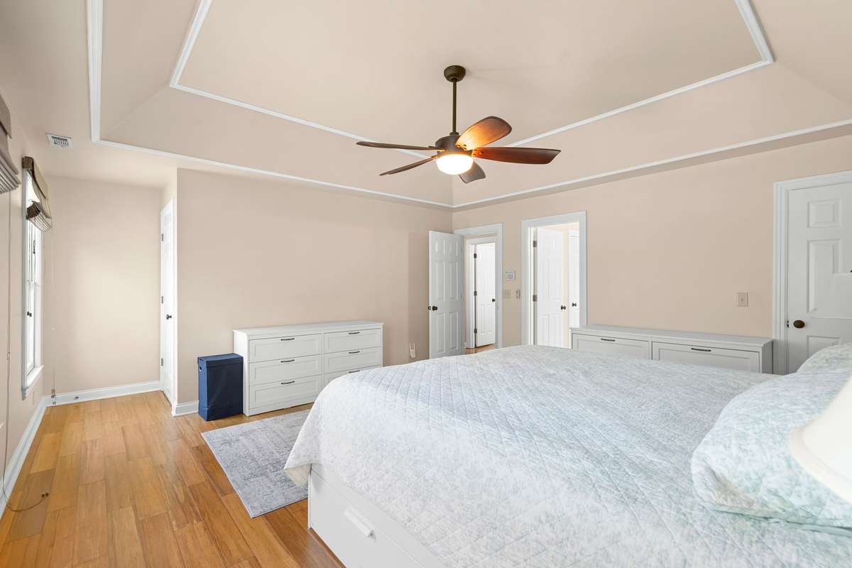 The primary suite also house the door leading to the attic access with ample space for extra storage!