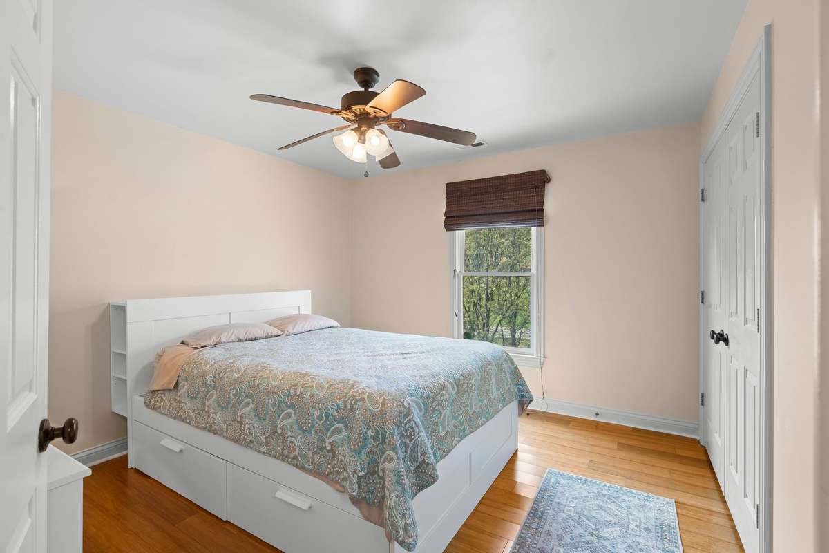 Bedroom #3 sits in the middle of the home and faces the backyard.