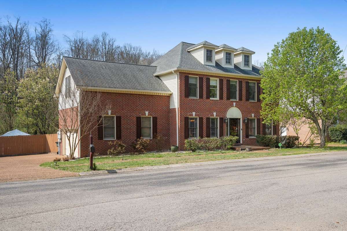 This home is located a quiet cul-de-sac just minutes from the heart of Bellevue and the i40 entrance. (Window shutters, front door, and side light framing freshly painted!)
