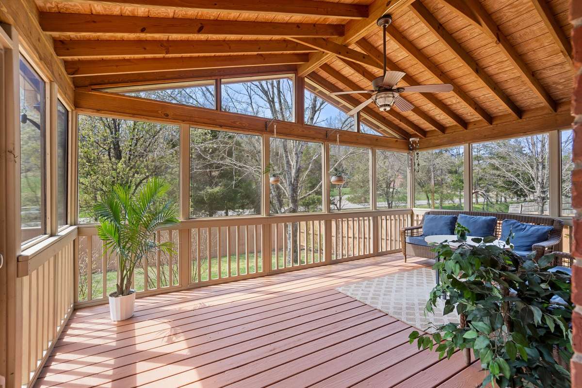 Beautiful screen-in back porch with ceiling fan and freshly painted decking. With no homes behind the property you can take in all the beautiful scenery of Nashville!