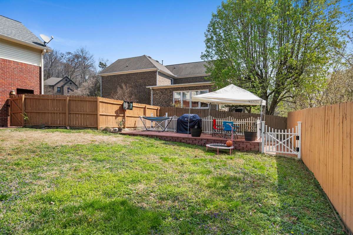 The backyard is not only full fenced in, but also a rare level lot in this neighborhood! The seller's spent $30k on the retaining wall that also doubles as an entertaining space + garden area.